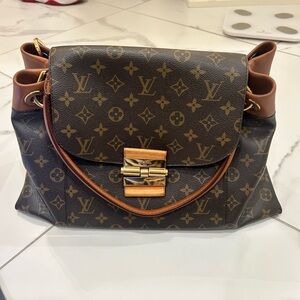 Louis Vuitton Purse 
$800